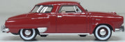 Oxford Diecast 87SC50003 1950 Studebaker Champion Starlight Coupe in Commanche Red, 1:87 scale model, right side view.