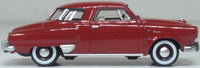 Oxford Diecast 87SC50003 1950 Studebaker Champion Starlight Coupe in Commanche Red, 1:87 scale model, right side view.
