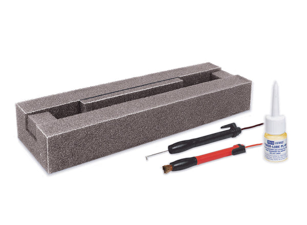 PECO PL-71 servicing kit with locomotive cradle, wheel cleaning brush, scraper and Power-Lube.
