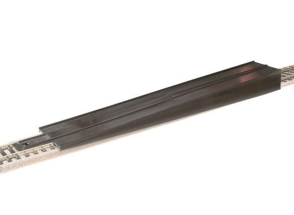PECO SL-37 OO/HO re-railer shown positioned on model railway track; track not included.