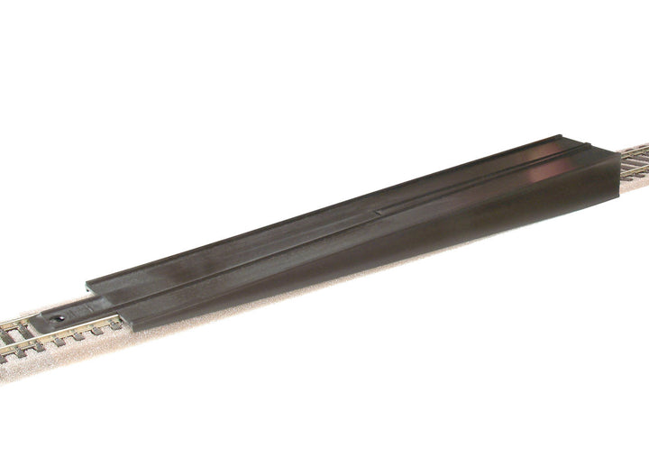 PECO SL-37 OO/HO re-railer shown positioned on model railway track; track not included.