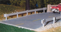 Pikestuff 541-0012 HO highway guardrails, assembled example beside a model road