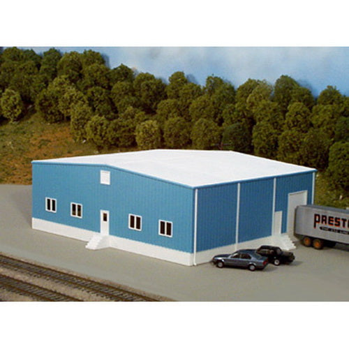 Pikestuff 541-0020 HO Tri-Star Industries blue building kit, assembled model in a railroad scene