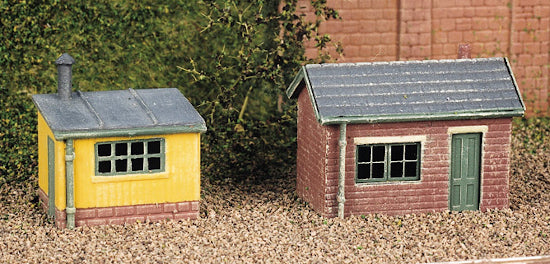 Assembled and painted Ratio 237 N scale brick and wooden lineside huts; scenery separate