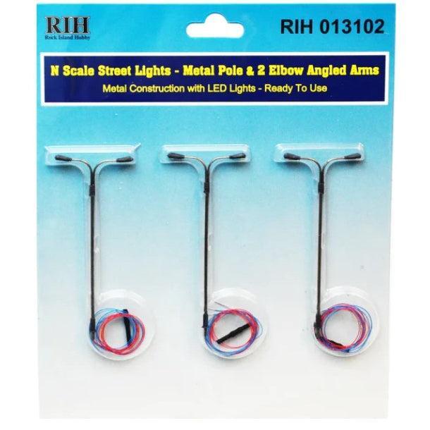 Rock Island Hobby 013102 N scale streetlights with metal poles and two elbow-angled arms, three-piece retail pack.