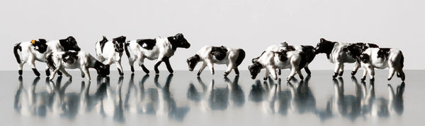 Rock Island Hobby RIH063302 N scale painted cows, manufacturer representative group photograph; full 12-piece set not shown.