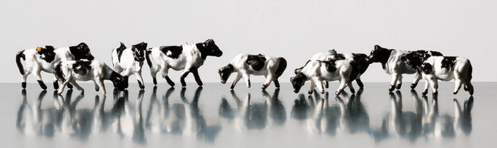 Rock Island Hobby RIH063302 N scale painted cows, manufacturer representative group photograph; full 12-piece set not shown.