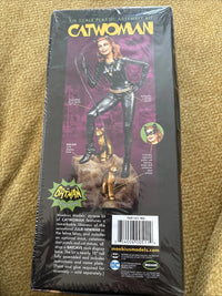 Moebius Catwoman box back showing optional mask, cat statues and Batcave base