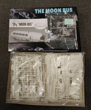 Moebius 2001-1 Moon Bus unassembled kit components with white sprues, clear parts, decal sheet and instructions