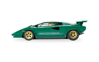 Scalextric C4500 Lamborghini Countach green slot car with gold wheels, left-side profile