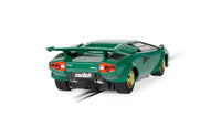 Scalextric C4500 Lamborghini Countach green slot car with gold wheels, rear three-quarter view