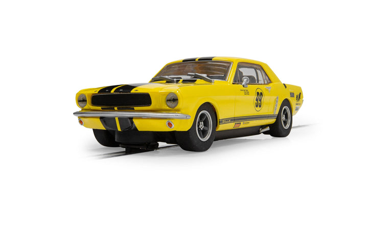Scalextric C4537 Ford Mustang Rassler Racing No. 99 yellow slot car, front three-quarter view
