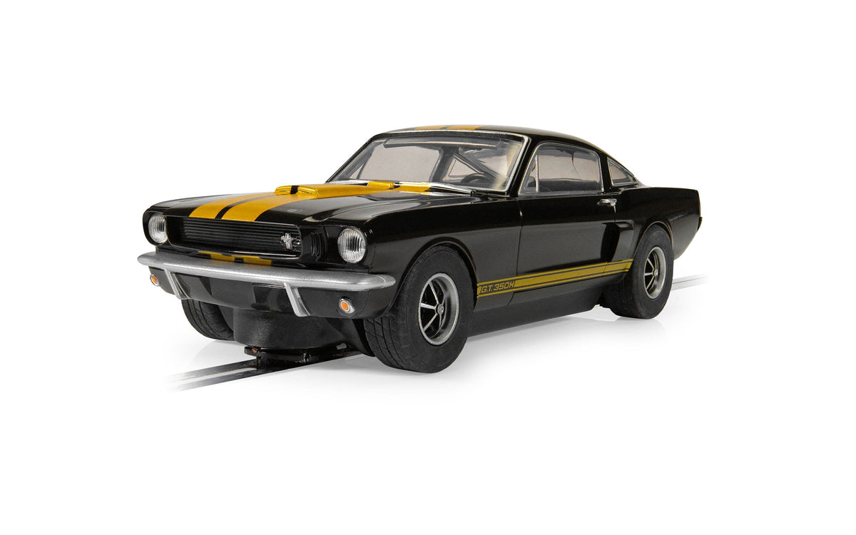 Scalextric C4542 Shelby Mustang GT350H Hertz Edition black and gold slot car, front three-quarter view