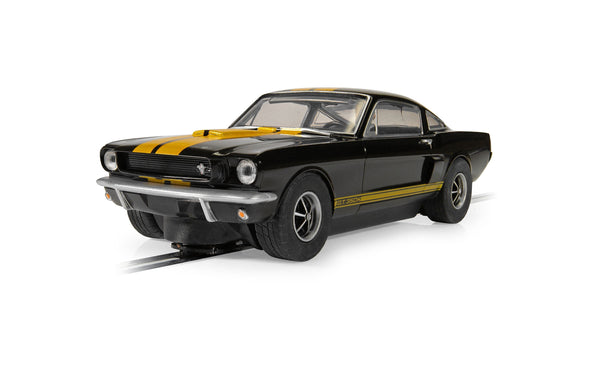 Scalextric C4542 Shelby Mustang GT350H Hertz Edition black and gold slot car, front three-quarter view
