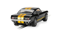 Scalextric C4542 Shelby Mustang GT350H Hertz Edition black and gold slot car, rear three-quarter view