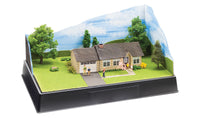 Scene-A-Rama SP4244 Home Kit in a finished diorama example; base, backdrop, figures and landscaping sold separately