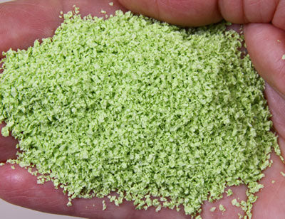 Scenic Express 6212 Pale Green SuperLeaf, 16 oz; manufacturer leaf-flake sample in hand, package not shown.