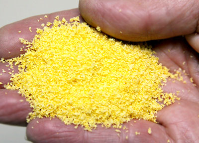Scenic Express 6312 Maize Yellow SuperLeaf, 16 oz; manufacturer leaf-flake sample in hand, package not shown.
