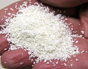 Scenic Express 6513 White Blossom SuperLeaf, 24 oz Eco Pak; manufacturer leaf-flake sample in hand, package not shown.