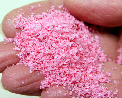 Scenic Express 6533 Pink Petunia Leaf Petals, 24 oz Eco Pak; manufacturer leaf-flake sample in hand, package not shown.