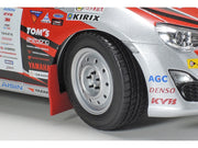 Tamiya 24337 GAZOO Racing TRD 86 1/24 model kit — assembled and painted example, wheel and mudflap detail