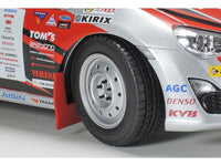 Tamiya 24337 GAZOO Racing TRD 86 1/24 model kit — assembled and painted example, wheel and mudflap detail