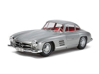 Tamiya 24338 Mercedes-Benz 300 SL 1/24 model kit — assembled and painted example, front three-quarter view