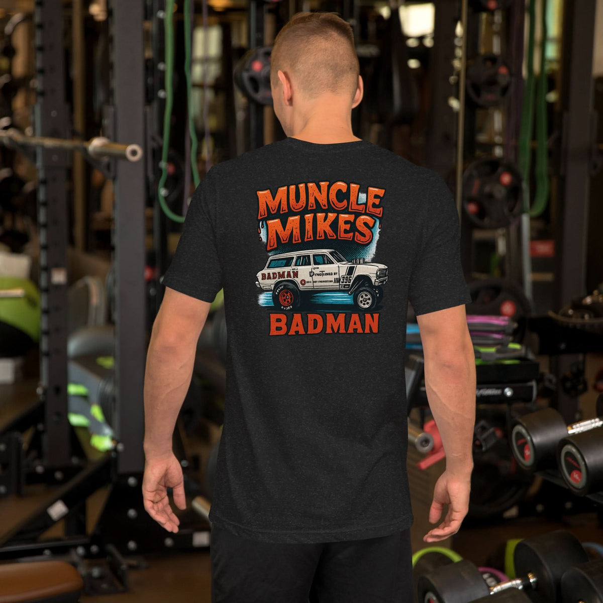 Back view of black heather BADMAN Wagon unisex T-shirt