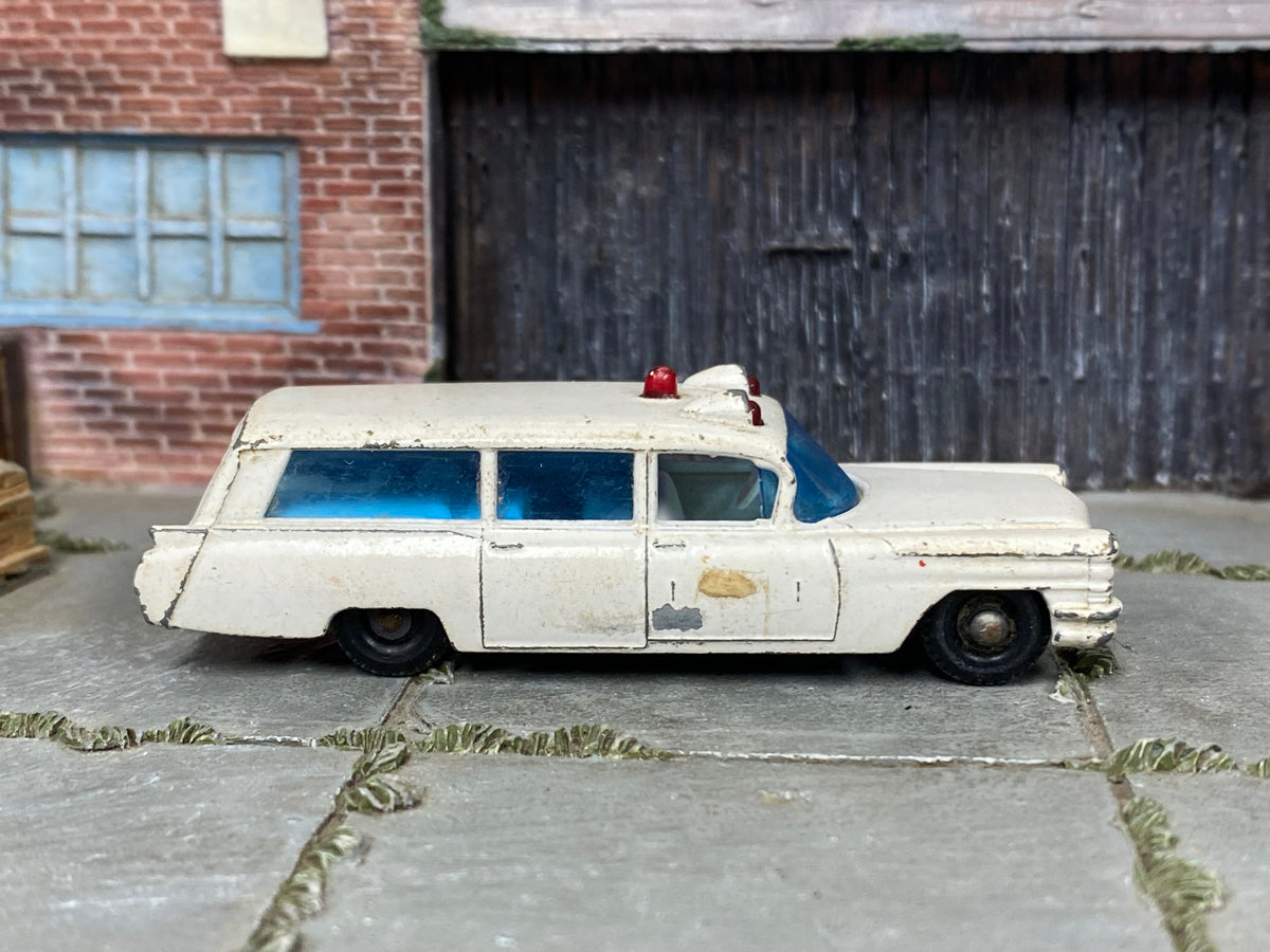 Lesney Matchbox No.54 S&S Cadillac Ambulance — side view — actual item condition photo