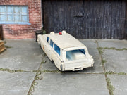 Lesney Matchbox No.54 S&S Cadillac Ambulance — front or rear view — actual item condition photo