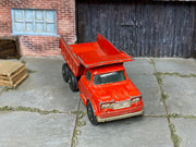 Lesney Matchbox No.48 Dodge Dumper Truck — three-quarter view — actual item condition photo