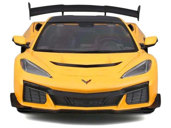 Yellow Chevrolet Corvette ZR1 coupe with dark roof, unboxed front view, Maisto 1:18.
