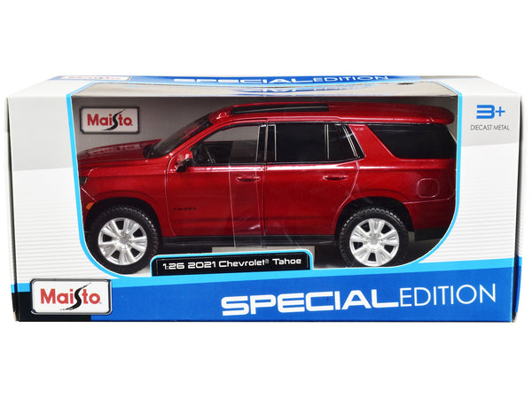 Red metallic 2021 Chevrolet Tahoe in Maisto Special Edition packaging marked 1:26 scale.