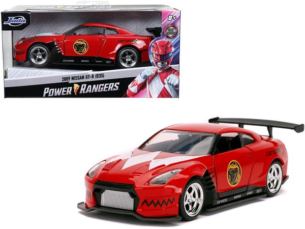 Red 2009 Nissan GT-R R35 with white Power Rangers graphics and black rear wing, beside Jada 31827 packaging