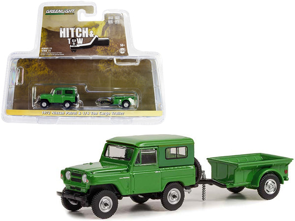 Green 1972 Nissan Patrol with matching open quarter-ton cargo trailer, shown beside its GreenLight 1:64 package, item 32250A.