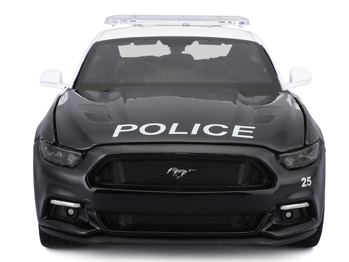 Black and white 2015 Ford Mustang GT police model, unboxed front view, Maisto Authority 1:24.