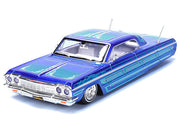 1964 Chevrolet Impala SS Lowrider Candy Blue with Graphics and White Interior "Lowriders" "Maisto Design" Series 1/26 Diecast Model Car by Maisto image 2