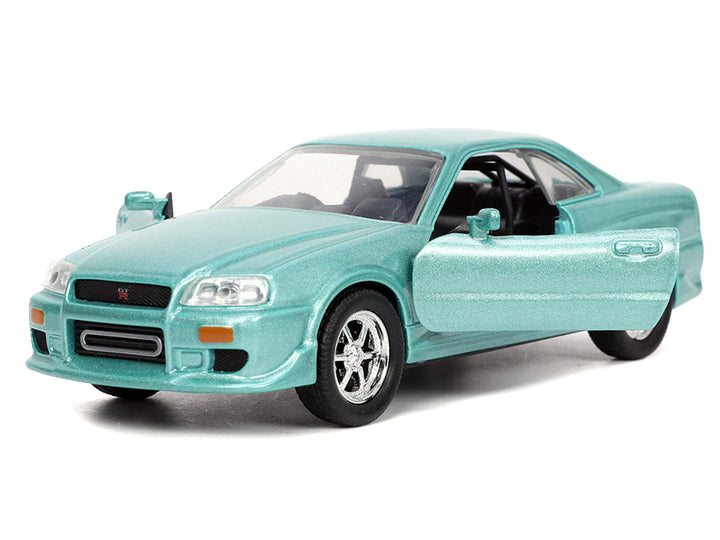 Brian's Nissan Skyline GT-R (BNR34) RHD (Right Hand Drive) Turquoise Metallic "Fast & Furious" Movie 1/32 Diecast Model Car by Jada image 2