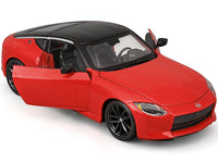 Maisto 1:24 2023 Nissan Z in red with black roof.