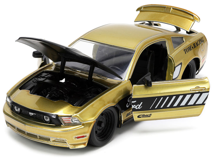 2010 Ford Mustang GT Gold Metallic with Black Graphics and Hood "Tom's Racing" "Bigtime Muscle" Series 1/24 Diecast Model Car by Jada image 2