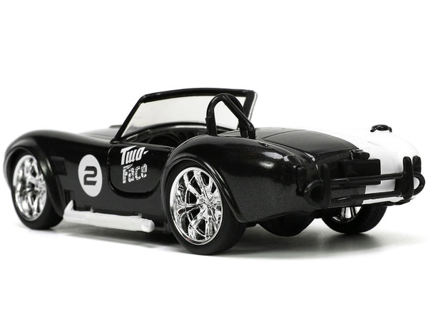 Jada 33091 black and white 1965 Shelby Cobra 427 S/C number 2 with Two-Face figure, Batman, 1:32 car