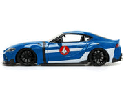 2020 Toyota Supra Blue with Graphics and Max Sterling Diecast Figurine "Robotech" "Hollywood Rides" Series 1/24 Diecast Model Car by Jada image 2
