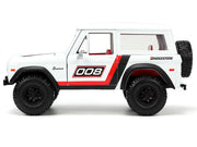 1973 Ford Bronco #008 White with Red and Black Stripes and Red Interior with Extra Wheels "Just Trucks" Series 1/24 Diecast Model Car by Jada image 2