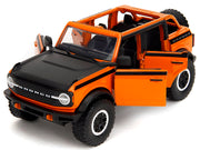 2021 Ford Bronco Open-Top Orange with Black Stripes and Hood with Extra Wheels "Just Trucks" Series 1/24 Diecast Model Car by Jada image 2