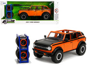 2021 Ford Bronco Open-Top Orange with Black Stripes and Hood with Extra Wheels "Just Trucks" Series 1/24 Diecast Model Car by Jada image 5