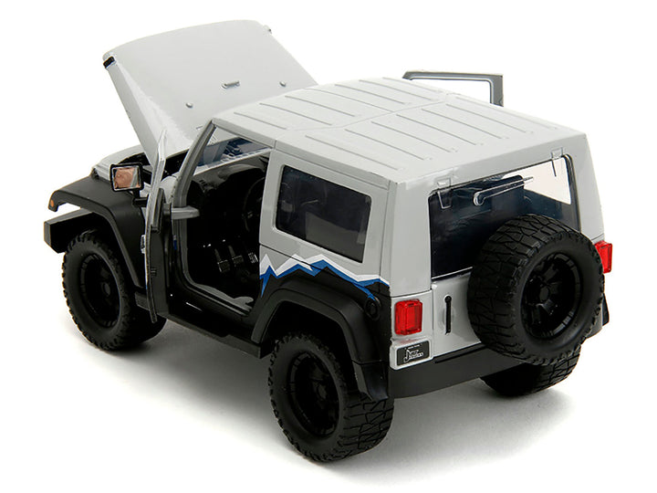 2007 Jeep Wrangler Gray and Black with Blue and White Stripes with Extra Wheels "Just Trucks" Series 1/24 Diecast Model Car by Jada image 2
