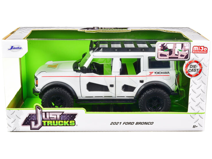 2021 Ford Bronco White with Red Stripes and Roof Rack "Yokohama Tires" "Just Trucks" Series 1/24 Diecast Model Car by Jada image 2