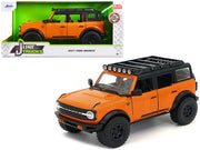 2021 Ford Bronco Orange with Black Stripes and Roof Rack "Just Trucks" Series 1/24 Diecast Model Car by Jada image 2