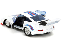 Rear three-quarter view of Jada 34793 Porsche 935 Turbo with both doors open and blue and red roof stripes