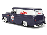 Rear three-quarter view of dark blue Chevron 1957 Chevrolet Suburban with white upper panels, Jada 35044